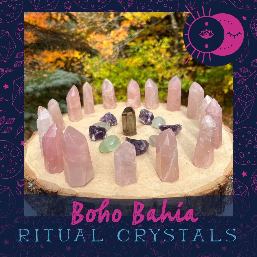 A crystal grid is created with Brazilian crystal towers of rose quartz, amethyst, smoky quartz and fluorite stones.